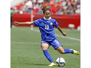 Thailand's Sunisa Srangthaisong (10) kicks the ball on net against Norway during the first half of their first match of the FIFA Women's World Cup at TD Place in Ottawa Sunday June 07, 2015.