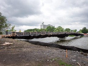 The bike and pedestrian bridge over the Rideau River at Strathcona Park is nearing completion. The concrete deck was poured this week and now is curing.