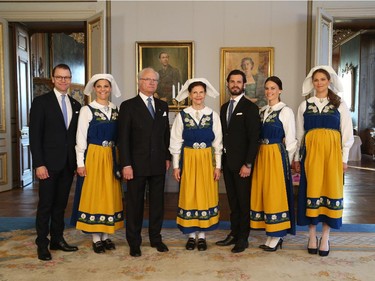 And just for fun, here is the official portrait of the Swedish Royal family dressed in their traditional costume, from left Prince Daniel, Crown Princess Victoria, King Carl Gustaf, Queen Silvia, Prince Carl Philip, his fiancee Sofia Hellqvist and Princess Madeleine taken during a reception at the Royal Palace during the National Day of Sweden celebrations in Stockholm Saturday, June 6, 2015.