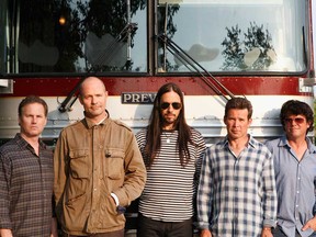 The Tragically Hip perform on July 17. From left: Johnny Fay, Gord Downie, Rob Baker, Gord Sinclair, Paul Langlois.