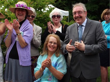 This was the view from the runway -- Irish Ambassador Ray Bassett and his wife, Patricia (seated) -- as seen by the models in the Sukhoo Sukhoo fashion show, presented during the annual garden party for Cornerstone Housing for Women on Sunday, June 7.