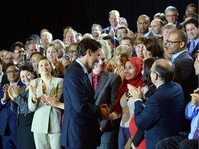 Liberal Party Leader Justin Trudeau greets supporters as he makes an announcement on changing government in Ottawa on Tuesday, June 16, 2015.