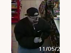 Robbery suspect in cat mask.