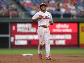 PHILADELPHIA, PA - JULY 30: Ben Revere #2 of the Philadelphia Phillies smiles on the base path after a foul ball in the first inning during a game against the Atlanta Braves at Citizens Bank Park on July 30, 2015 in Philadelphia, Pennsylvania. The Phillies won 4-1. (Photo by Hunter Martin/Getty Images)