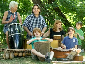 The beat goes on: From left, Yvonne Makosz, Mick Gzowski and Mary Houle, with the Gzowski children Simon, Casimir and Mattie, bang on drums and percussion instruments donated by Makosz to Lord Aylmer Elementary school. The drums belonged to Makosz's late husband Donald Lahey.