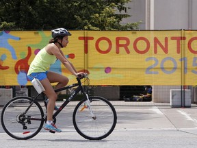 A cyclist pedals at Exhibition Place ahead of the Pan Am Games, Wednesday, July 8, 2015, in Toronto. The game will official start with Friday's opening ceremony.