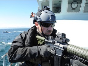 A member of the Royal Canadian Navy's new Maritime Tactical Operations Group conducts a practice search of a vessel during a recent drill of the unit's capabilities off the west coast.

(David Pugliese/Ottawa Citizen)
