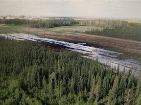 A Nexen-supplied image of a pipeline oil spill near the Long Lake oil sands operation is shown at a press conference in Calgary, Alta., Friday, July 17, 2015.