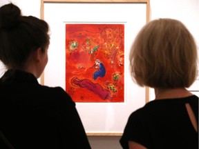 Anna Clairmont (R) and Amy Allen enjoy the media preview of the Chagall: Daphnis & Chloé exhibit at the National Gallery in Ottawa.