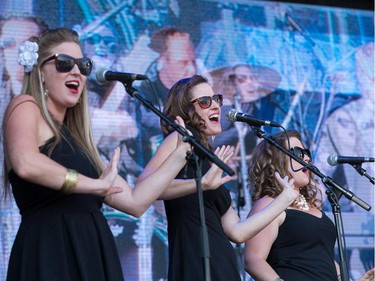 Back up singers for Bluestone & the Memphis Moonshine on the Monster Energy Stage as day 8 of the RBC Ottawa Bluesfest gets underway at the Canadian War Museum.