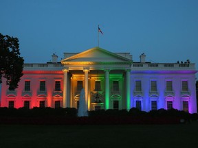 Rainbow-colored lights shine on the White House to celebrate the US Supreme Court ruling in favor of same-sex marriage June 26, 2015 in Washington, DC.