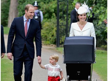 Britain's Catherine, Duchess of Cambridge (R), Britain's Prince William, Duke of Cambridge (L) and their son Prince George of Cambridge (C) arrive with Princess Charlotte of Cambridge, in her pram for Charlotte's Christening at St. Mary Magdalene Church in Sandringham, England, on July 5, 2015. Crowds gathered outside Queen Elizabeth II's country residence on Sunday for the christening of Britain's baby Princess Charlotte, who it was announced will have five godparents.