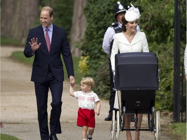 Britain's Prince William, Kate the Duchess of Cambridge, their son Prince George and daughter Princess Charlotte in a pram arrive for Charlotte's Christening at St. Mary Magdalene Church in Sandringham, England, Sunday, July 5, 2015.
