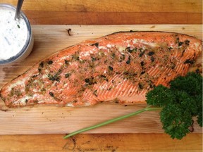 The lemon-thyme-pepper rub on this salmon goes particularly well with the smoky flavour from a cedar plank.