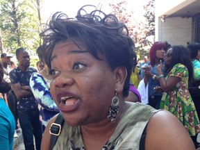 Rachel Kaniki of Montreal was among the hundreds of Congolese Canadians gathered outside the courthouse.