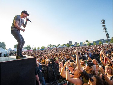 Dallas Smith on the Bell Stage as day 8 of the RBC Ottawa Bluesfest gets underway at the Canadian War Museum.