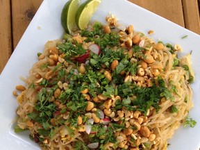 Crisp asparagus, sweet new peas and crunchy radish slices brighten this classic Thai dish.