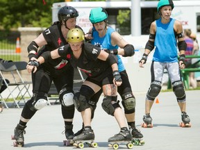 Free Roller Derby Day took place at Marion Dewar Plaza in front of Ottawa City Hall Saturday July 11, 2015.