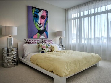 For more feminine tastes, another bedroom offers a pop-art canvas and silver bedside tables and lamps.