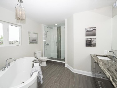 The master ensuite is spacious and offers soft, soothing tones, perfect for pampering.