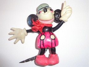 Despite being damaged, a very rare Mickey or Minnie Christmas ornament is worth about $75.