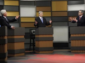 Bloc Quebecois Leader Gilles Duceppe, Prime Minister Stephen Harper and then-Liberal Leader Michael Ignatieff debate during the French language federal election debate in Ottawa in 2011.