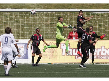 Goalie Romuald Peiser, in green, is the Fury's MVP so far this season.