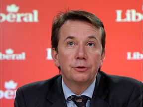 Scott Brison holds a press conference on government advertising in Ottawa, Wednesday, March 4, 2015.