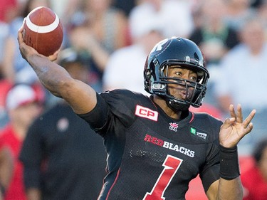 Henry Burris makes a pass in the second quarter.