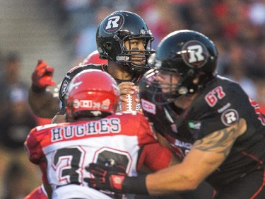 Henry Burris stands in the pocket during the second quarter.