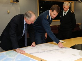 The Honourable Rob Nicholson, Minister of National Defence (left) and Lieutenant-General Guy Thibault, Vice Chief of the Defence Staff (right) receive an update on the Disaster Assistance Response Team’s deployment by Major General Michael Hood, Director of Staff at Strategic Joint Staff, in Ottawa, on November 13, 2013.

Photo: Corporal Lindsay Grimster Canadian Forces Support Unit (Ottawa) Imaging Services

Le major-général Michael Hood, directeur à l’État-major interarmées stratégique, fait un compte rendu sur le déploiement de l’Équipe d’intervention en cas de catastrophe à l’honorable Rob Nicholson, ministre de la Défense nationale, (à gauche) et au lieutenant général Guy Thibault, vice-chef d’état-major de la Défense (à droite), à Ottawa, le 13 novembre 2013. 

Photo : Caporal Lindsay Grimster, Services d’imagerie de l’Unité de soutien 
SU2013-0614-02