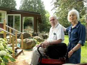 Bruce and Lynne Hopper want to sell their home, which backs on to the Jock River, but say the city's long-range plans for a park on the site have scared away potential buyers.