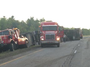 The scene at a truck rollover on Highway 401.