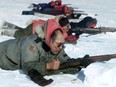 This 2001 photo shows Canadian Ranger Andrew Anaktak of the Kugluktuk Ranger Patrol prepares to fire his CF-issue .303-calibre Lee-Enfield bolt-action rifle. DND photo.