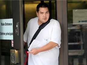 Samuel Lute leaves the courthouse in Ottawa Friday July 24, 2015. Lute was released from custody on a $2,500 bond after a court appearance Friday. Lute was charged with two counts of sexual assault and sexual interference after police alleged he had inappropriate contact with two preteen girls at the Kanata Wave Pool on Thursday. Tony Caldwell/Ottawa Sun/Postmedia Network