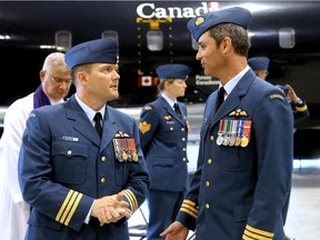 Members of 412 Transport Squadron welcomed their new Commanding Officer, Lt. Col. Aidan Costelloe (left), and bid farewell to their outgoing commander, LCol. Michael Thornley (right), at a Change of Command ceremony.