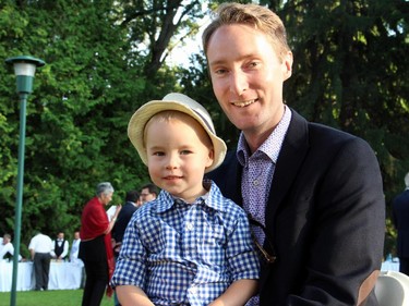 Nathan Medd, managing director of English Theatre at the National Arts Centre, with his adorable two-year-old son Elki at the 20th Annual Garden Party for Opera Lyra Ottawa, held at the official residence of the Italian ambassador on Wednesday, July 8, 2015.