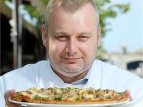 National Arts Centre Executive Chef, John Morris, shows his delicious Mushroom and Asparagus Pizza, made from local ingredients. The NAC is taking part in Savour Ottawa Tables, which includes a number of city restaurant deals. (Julie Oliver / Ottawa Citizen)