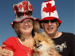 Michelle Fortin , her husband, Stéphan, and their dog, Meeka on Canada Day in 2010.