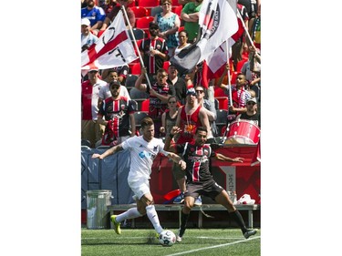 Paulo Junior (R) of the Ottawa Fury FC vies for the ball with Carolina RailHawks Wes Knight (L) during the teams NASL game at TD Place in Ottawa, July 26, 2015.