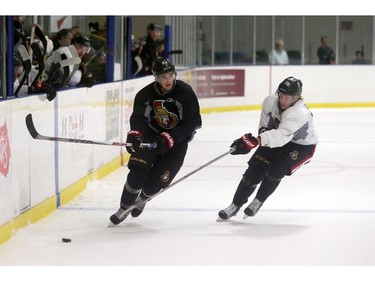 Prospects Colin White #82 and Filip Chlapik #78 of the Ottawa Senators chase the puck during a scrimmage at the Kanata Recreation Centre in Ottawa on July 2, 2015.