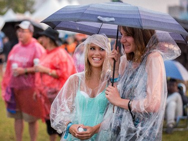 Rain didn't dampen the fun for Kelly Gardiner, left, and Gemma Rod.