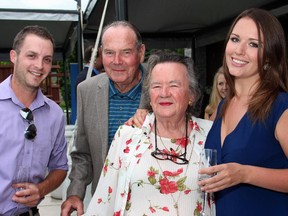 Roger and Eleanor Hadfield, parents of retired Canadian astronaut Chris Hadfield, with granddaughter Claire Appleton and her boyfriend, Ryan Naylor, at a reception hosted by Vintage Wings of Canada founder Mike Potter at his Rockcliffe Park residence on Tuesday, June 30, 2015, to celebrate that day's Hadfield Youth Summit and Vintage Wings Open House.