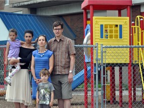 Souneeta Millington, left, and her two children Jaya and Kiran, with Renée Soublière and Etienne Trepenier. All three are parents with children at Beausoleil Child Care Centre.
