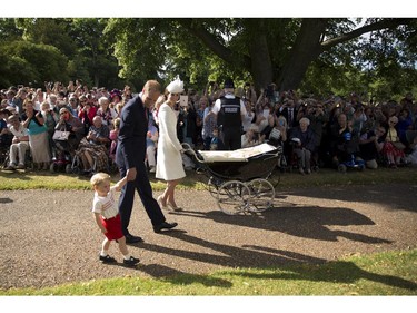 Catherine, Duchess of Cambridge, Prince William, Duke of Cambridge, Princess Charlotte of Cambridge and Prince George of Cambridge arrive at the Church of St Mary Magdalene on the Sandringham Estate for the Christening of Princess Charlotte of Cambridge on July 5, 2015 in King's Lynn, England.