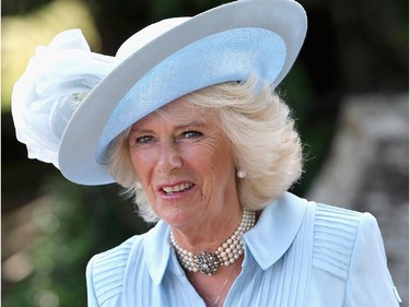 Camilla, Duchess of Cornwall arrives at the Church of St Mary Magdalene on the Sandringham Estate for the Christening of Princess Charlotte of Cambridge on July 5, 2015 in King's Lynn, England.