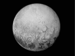 This July 11, 2015, image provided by NASA shows Pluto from the New Horizons spacecraft. On Tuesday, July 14.