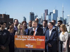 Leader of the NDP Tom Mulcair launches his Ontario Tour for Change alongside NDP MPs and candidates at a media event in Toronto on Monday, July 20 2015.