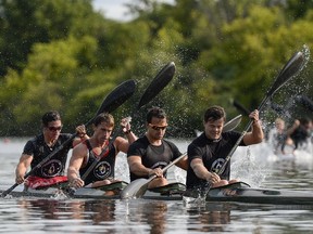 Adam van Koeverden (second from right) and his Burloak Canoe Club teammates, from left, Chris Mehak, Brady Reardon and Rob Clarke, race to a first-place finish in the senior men's K4 1,000 metres at Mooney's Bay on Friday, Aug. 28, 2015.