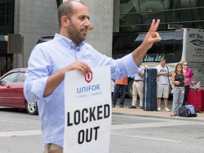 Airline passengers wait for rides from friends and family as members of the Airport Taxi Union conducted a noisy demonstration at the airport.